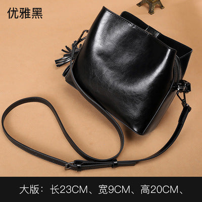 Cowhide Bag Fashion Genuine Leather Bag Fringe Bag Women Crossbody Bag Bucket Bag Shoulder Bag.Pochette