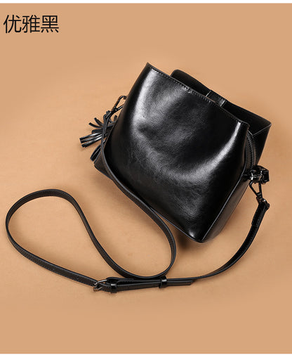 Cowhide Bag Fashion Genuine Leather Bag Fringe Bag Women Crossbody Bag Bucket Bag Shoulder Bag.Pochette