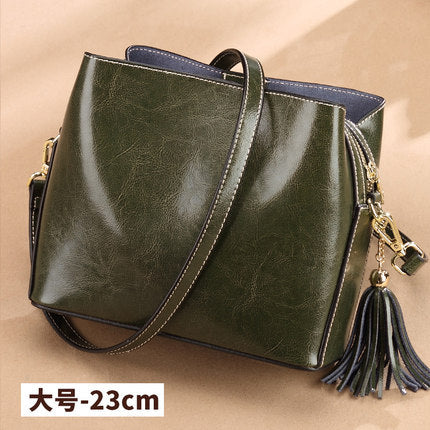 Cowhide Bag Fashion Genuine Leather Bag Fringe Bag Women Crossbody Bag Bucket Bag Shoulder Bag.Pochette