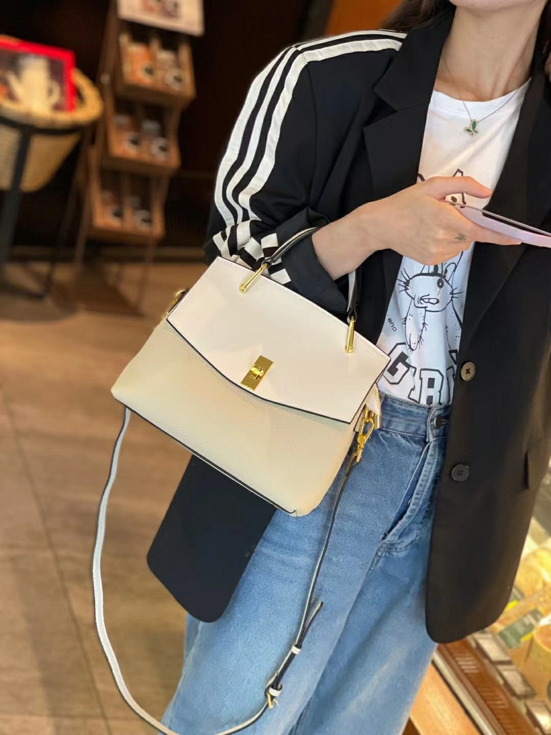 Genuine leather women's handbag Kelly bag that matches any temperament Casual Kelly bag Commuting OL shoulder bag.Pochette