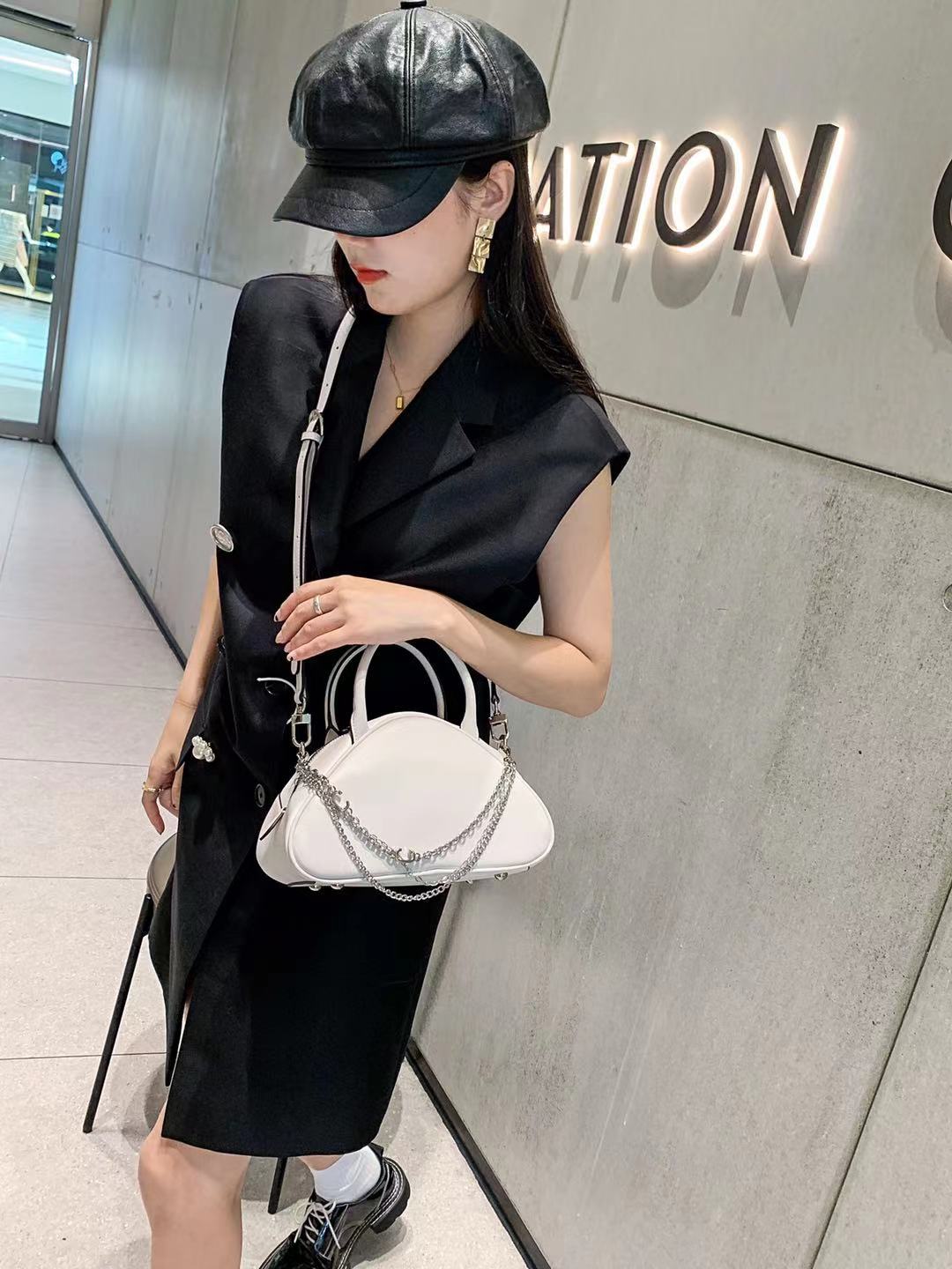 Women's handbag crossbody bag genuine leather triangular chain bag luxury fashion irregular handbag.bag