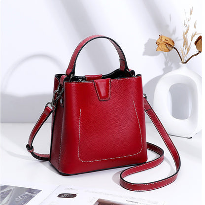 Genuine leather women's bag fashion large capacity cowhide handbag exquisite bucket bag retro shoulder bag that goes with anything. Pochette